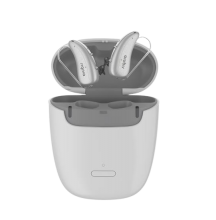 Rechargeable hearing aid batteries in a charger